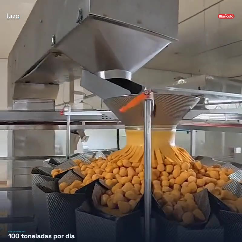 Envase multicabeçote na fábrica da Luza Foods